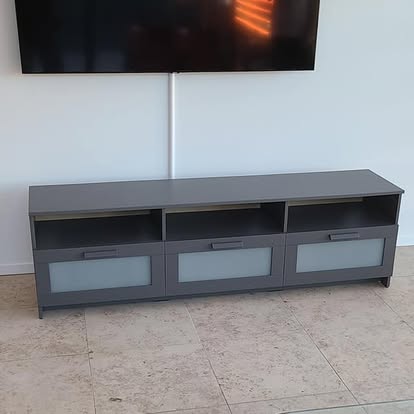 Assembled modern TV stand with mounted television
