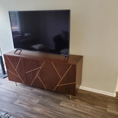 Wall-mounted TV installation