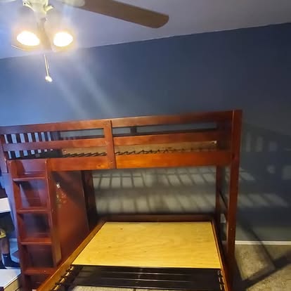 Assembled loft bunk bed in blue bedroom